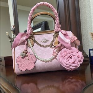 Coach Pink and Tan Satchel